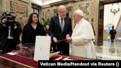 Lebanese Prime Minister Najib Mikati meets Pope Francis at the Vatican, Nov. 25, 2021.