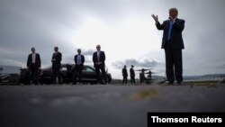 El presidente de Estados Unidos, Donald Trump, arriba al aeropuerto de Ashville en Carolina del Norte.