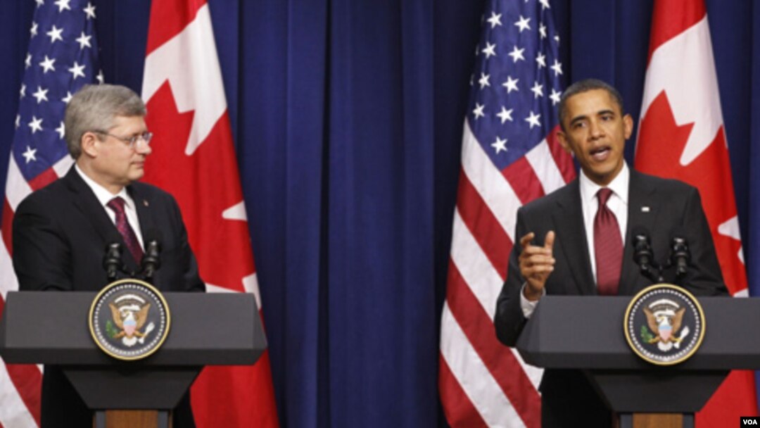 Presiden AS Barack Obama dan PM Kanada Stephen Harper berbicara kepada media di Gedung Putih, Jumat (4/2).