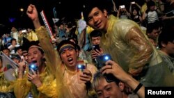 FILE - Supporters attend a rally after Taiwan's constitutional court ruled that same-sex couples have the right to legally marry, the first such ruling in Asia, in Taipei, Taiwan, May 24, 2017.