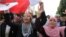 Tunisian women during a gathering at Habib Bourguiba avenue in Tunis to celebrate the one year anniversary of the revolution, January 14, 2012. 
