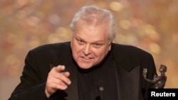 Actor Brian Dennehy holds his award for best actor in a television miniseries or movie during the 7th annual Screen Actors Guild Awards in Los Angeles March 11, 2001. Dennehy won for his performance in Arthur Miller's "Death of a Salesman."