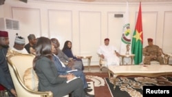 An ECOWAS delegation led by Niger's former president, Mahamadou Issoufou meets with Burkina Faso's new military leader Ibrahim Traore in Ouagadougou, October 4, 2022.