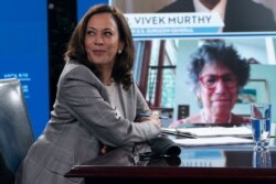 FILE - Sen. Kamala Harris, D-Calif., chosen by Joe Biden to be his running mate on the Democrats' 2020 national ticket, receives a virtual briefing on COVID-19 from public health experts in Wilmington, Del., Aug. 13, 2020.