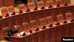 Romania's President Traian Basescu sits inside the Parliament before the vote on his suspension, Bucharest July 6, 2012.