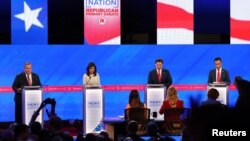 Cuatro candidatos republicanos se preparan para el comienzo del debate de primarias en Tuscaloosa, Alabama, el 6 de diciembre de 2023.