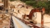 FILE - A general view shows a mineral processing plant in Gatumba, western Rwanda.