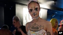 The Berlin-based drag performer known as Hungry poses backstage at Le Poisson Rouge cabaret in New York after performing, Sunday, Sept. 9, 2018, in the “The Gift of Showz,” a drag show presented by the Opening Ceremony label at New York Fashion Week. 