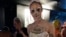 The Berlin-based drag performer known as Hungry poses backstage at Le Poisson Rouge cabaret in New York after performing, Sunday, Sept. 9, 2018, in the “The Gift of Showz,” a drag show presented by the Opening Ceremony label at New York Fashion Week. 