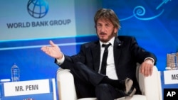 FILE - In this Oct. 8, 2015 file photo, Sean Penn speaks during a forum with young entrepreneurs during the IMF and World Bank annual meeting in Lima, Peru. 