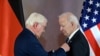 German President Frank-Walter Steinmeier (L) awards US President Joe Biden with the Grand Cross special class of the Order of Merit (Bundesverdienstkreuz), the highest civilian award in Germany, during a ceremony at Bellevue presidential palace, in Berlin