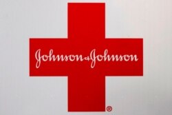 FILE - A Johnson & Johnson logo appears on the exterior of a first aid kit in Walpole, Mass., Feb. 24, 2021.