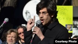 Demand Progress founder and director Aaron Swartz protesting against Stop Online Piracy Act (SOPA) bill, January 18, 2012. (Daniel J. Sieradski/Creative Commons)