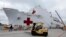 FILE - Supplies are loaded into the San Diego-based hospital ship USNS Mercy as it prepares for possible deployment to aid the typhoon-stricken areas of the Philippines from its port in San Diego, California, Nov. 15, 2013. 