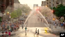 This image released by Warner Bros. Pictures shows a scene from "In the Heights." (Warner Bros. via AP)