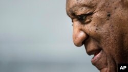 FILE - Bill Cosby departs after a pretrial hearing in his sexual assault case at the Montgomery County Courthouse in Norristown, Pennyslvania, Aug. 22, 2017. 