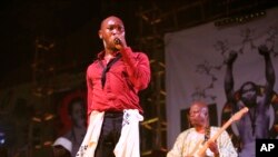 FILE - Seun Kuti performs at "Felabration," an annual event paying homage to his father, at the New Afrika Shrine in Lagos, Nigeria in the early hours of Sunday, Oct. 20, 2013