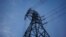 A high voltage power line tower is pictured after sunset in Sydney, Australia August 11, 2017. REUTERS/Jason Reed - RC1B8630BB90