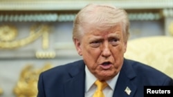 特朗普总统在白宫椭圆形办公室与日本首相高市早苗举行会晤期间发表讲话。(2026年3月19日)