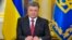FILE - Ukrainian President Petro Poroshenko makes a televised address in Kyiv.