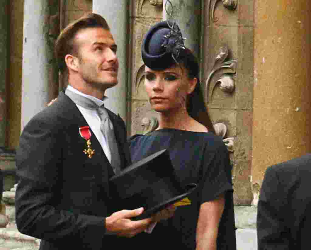 Soccer star David Beckham and his wife Victoria at Westminster Abbey for the royal wedding. (Reuters/Kai Pfaffenbach)