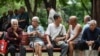 People rest at a park in Fuyang in eastern China's Anhui province on Sept. 13, 2024. China said on Sept. 13 it would gradually raise its statutory retirement age, as the country grapples with a looming demographic crisis and an older population.