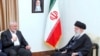 In this photo released by an official website of the office of the Iranian supreme leader, Hamas chief Ismail Haniyeh, left, speaks with Ayatollah Ali Khamenei in Tehran on March 26, 2024. A portrait of the late Iranian revolutionary founder Ayatollah Khomeini hangs on the wall.