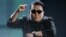 South Korean pop artist Psy performs "Gangnam Style" at the 40th American Music Awards in Los Angeles, California, November 18, 2012.