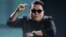 South Korean pop artist Psy performs "Gangnam Style" at the 40th American Music Awards in Los Angeles, California, November 18, 2012.