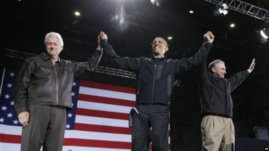 President Obama ari kumwe na president Clinton, imbere y'uko batangura ikoraniro