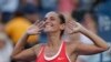 Roberta Vinci of Italy celebrates with the crowd after defeating Serena Williams of the US in their women's singles semi-final match at the US Open Championships tennis tournament in New York, Sept. 11, 2015.