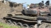 Tanks that have been destroyed during fighting between government and opposition are seen on July 10, 2016, in the Jabel area of Juba, South Sudan, July 16, 2016.