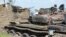 FILE - Tanks destroyed during fighting between forces of Salva Kiir and Riek Machar, on July 10, 2016 in Jabel area of Juba, South Sudan.
