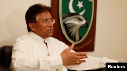 Former Pakistani president Pervez Musharraf speaks during an interview with Reuters in Dubai, January 8, 2012.