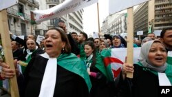 Algerian lawyers rally, March 23, 2019, to demand the departure of ailing 82-year-old Algerian President Abdelaziz Bouteflika at the end of his term scheduled for April 28, 2019. 