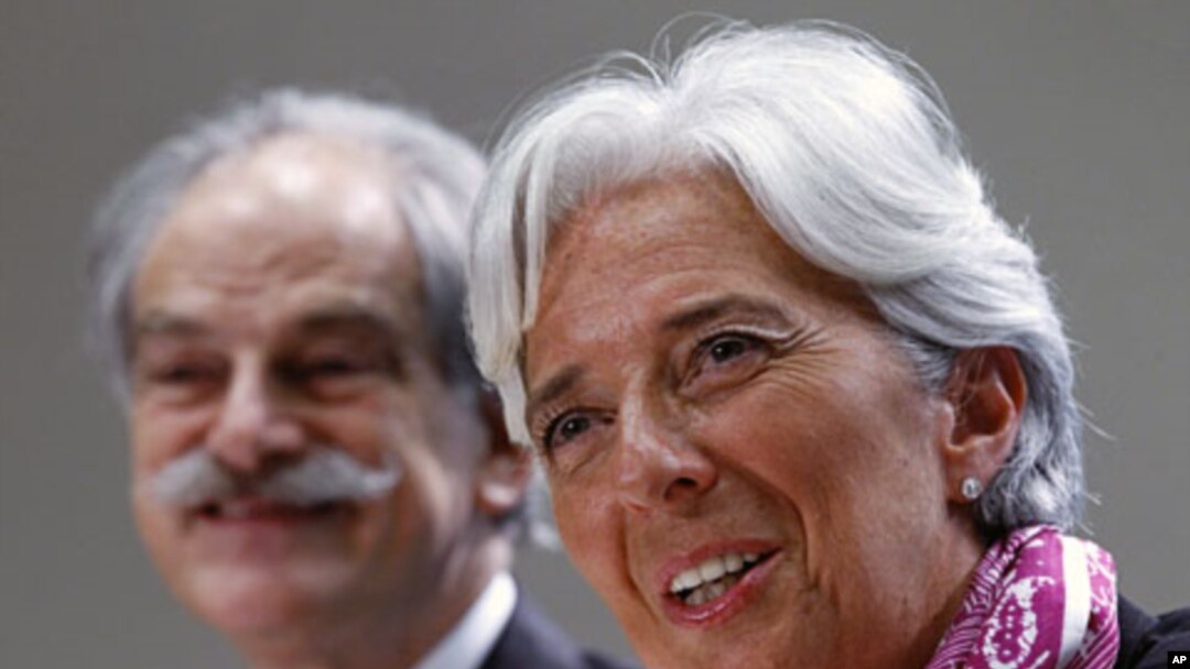 IMF Managing Director Christine Lagarde holds a news briefing at the International Monetary Fund headquarters in Washington July 6, 2011