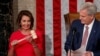 FILE PHOTO: House Speaker-designate Nancy Pelosi (D-CA) is handed the gavel by House Republican Leader Kevin McCarthy as the U.S. House of Representatives meets in Washington