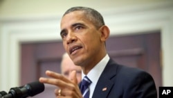 President Barack Obama announces he's rejecting the Keystone XL pipeline because he does not believe it serves the national interest, Nov. 6, 2015, in the Roosevelt Room of the White House in Washington. 