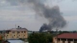 FILE - Black smoke rises above Juba, South Sudan, July 10, 2016. Explosions and heavy weapons gunfire shook the city as government and opposition forces clashed.