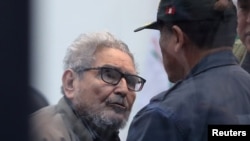 Shining Path founder Abimael Guzman attends a trial during sentence of a 1992 Shining Path car bomb case in Miraflores, at a high security naval prison in Callao, Peru, Sept. 11, 2018.