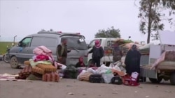 Displaced Raqqa Residents Receive Tents, Aid