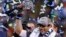 Seattle Seahawks quarterback Russell Wilson holds up the Vince Lombardi Trophy after the Seahawks defeated the Denver Broncos in the NFL Super Bowl XLVIII football game in East Rutherford, New Jersey, February 2, 2014.