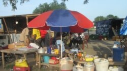 FILE-Traders selling goods at a South Sudan market in Bor, June 18, 2014.