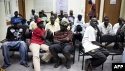 South Sudanese refugees are held at a detention center south of Tel Aviv, Israel, June 11, 2012.