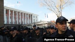 FILE - Turkish riot police stand as protestors demonstrate against France in front of the French embassy in Ankara, on Nov. 11, 2016.