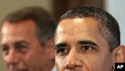 President Barack Obama and House Speaker John Boehner of Ohio, left, meet with Congressional leadership in the Cabinet Room of the White House, Sunday, July 10, 2011, in Washington, to discuss the debt.