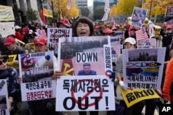 Demonstrators signifier    a rally against a caller    deployment of North Korean troops to Russia, adjacent   the Seoul Central District Court successful  Seoul, South Korea, Nov. 15, 2024.