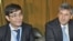Firoz Ali Alizada (L), a landmine victim and campaign manager for the International Campaign to Ban Landmines and Austrian Foreign Minister Michael Spindelegger speak to the press, at the European headquarters of the United Nations in Geneva, Switzerland,