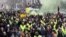 Los manifestantes participaron en una manifestación antigubernamental convocada por el movimiento "Gilets Jaunes" de los chalecos amarillos, en París, el 26 de enero.