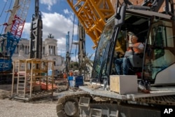 FILE - A view of the construction site of the new 25.5-kilometer Metro C subway main hub in Piazza Venezia in central Rome, May 23, 2024.